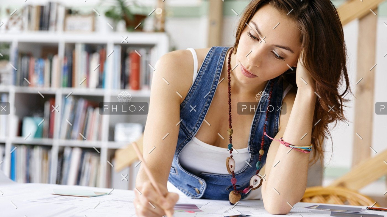 demo-attachment-169-young-pretty-woman-at-her-desk-PDDLFRL